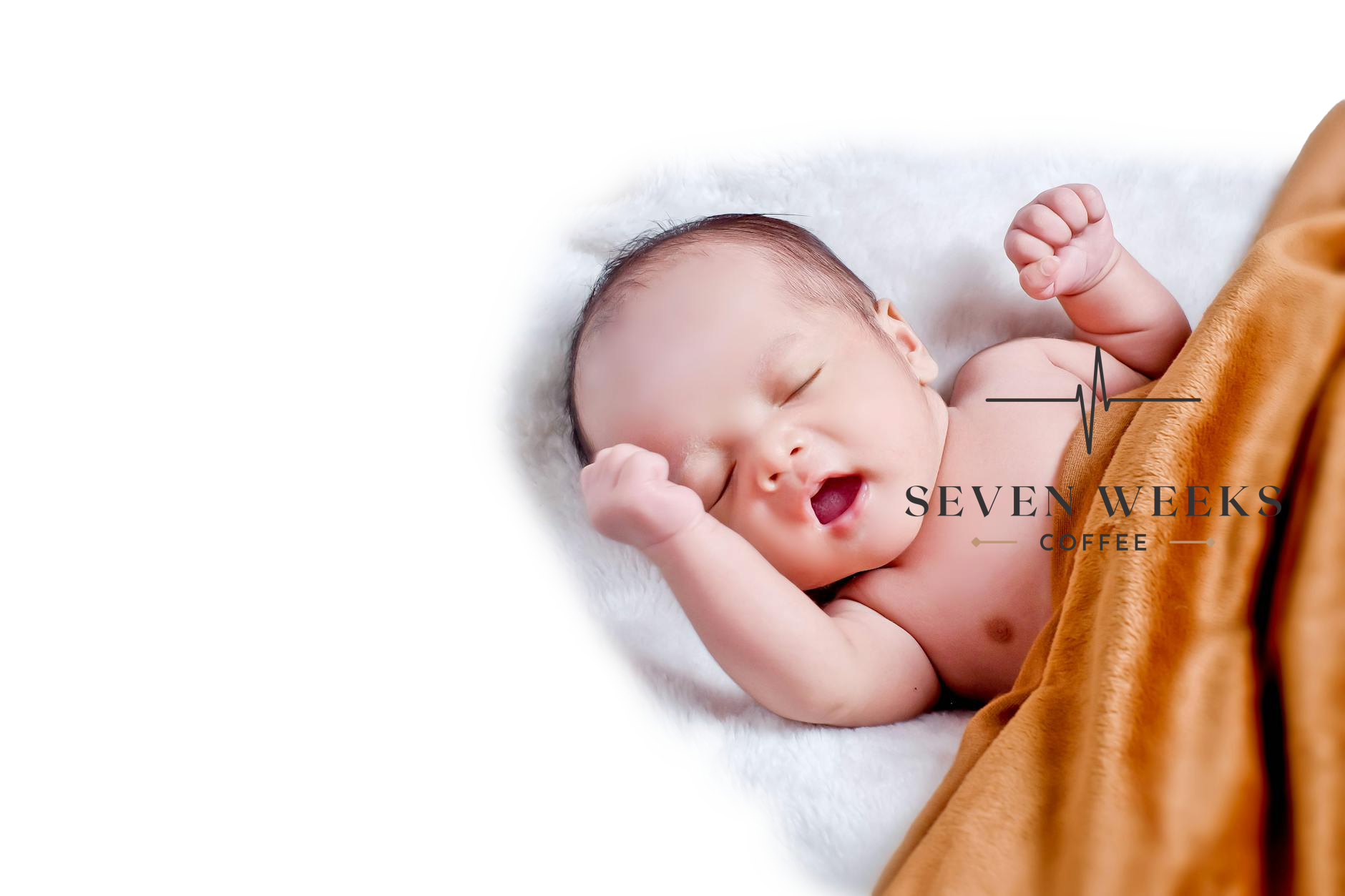baby laying on mat with an overlay of the seven weeks coffee logo.